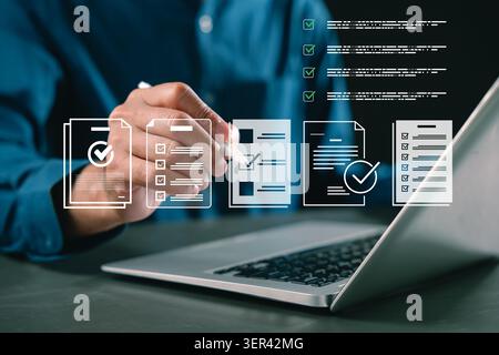 Checklist digital task management laptop document workflow online form improves productivity, while organization lets user mark completed items on vir Stock Photo