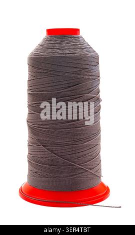 spool of colored thread on a white isolated background Stock Photo