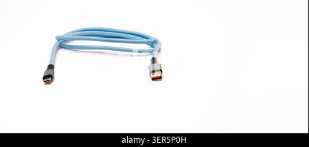 Braided light blue USB C style cable with gray connectors on a pure white background, showcasing modern technology for data transfer and electricity Stock Photo
