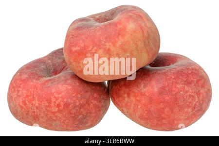 Stack of three whole ripe fig flat peaches with velvety skin, isolated background. Stock Photo