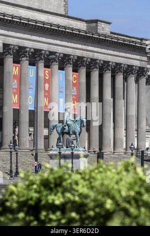 View of St George's Hall featuring the Prince Albert equestrian statue and colorful music month banners in Liverpool, England, United Kingdom. Stock Photo