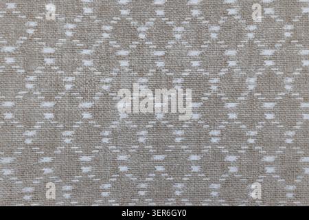 Woven textile background with repeating trellis design Stock Photo