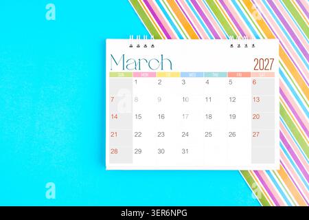 March 2027 desk calendar on yellow background, Front view Stock Photo - Alamy