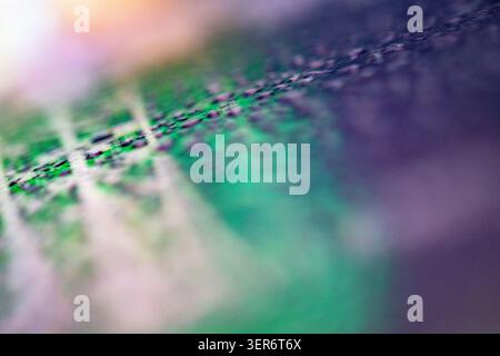Wafer surface displaying intricate abstract patterns of an electronic chip Stock Photo