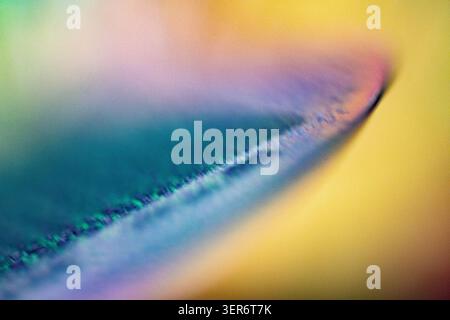 Electronic chip showing abstract technology and iridescent light with blurred colorful gradient Stock Photo