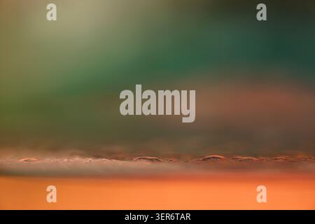 Wafer close up showing micro structures with soft green and orange colors Stock Photo