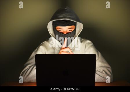 Cyber attacker Stock Photo