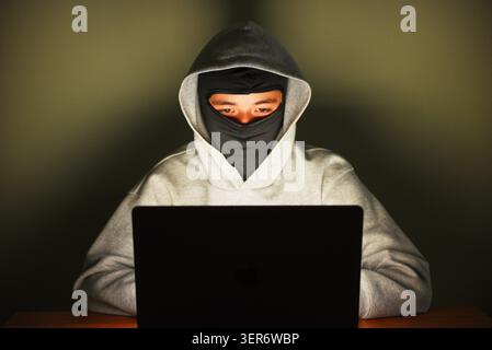 Cyber attacker Stock Photo