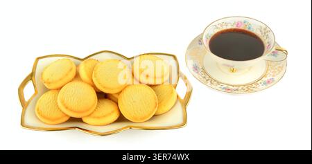 Crispy sweet biscuits pair perfectly with a fresh aromatic morning beverage for a cozy break. This high-quality commercial setup naturally highlights Stock Photo