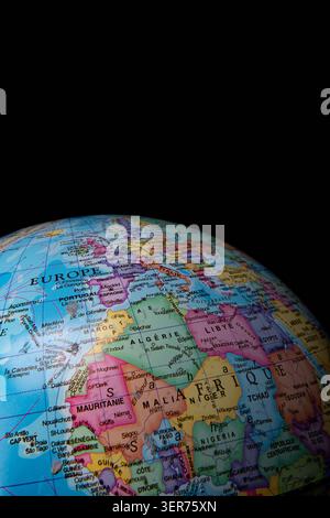 Earth globe displaying countries and borders of europe and north africa on a black background Stock Photo