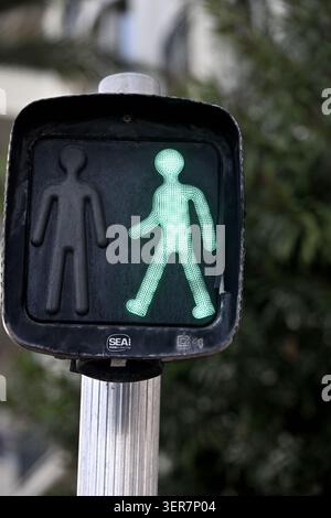 Pedestrian road crossing led green man OK to cross sign Stock Photo