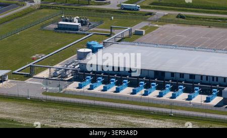 Aerial view of a modern datacenter in Middenmeer with cooling units and secure infrastructure, supporting cloud storage, big data processing, and mach Stock Photo