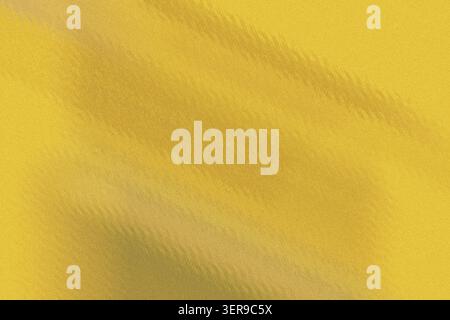 A high-quality abstract background featuring a fine, grainy texture with soft diagonal light and shadow gradients in vibrant golden yellow tones. Stock Photo