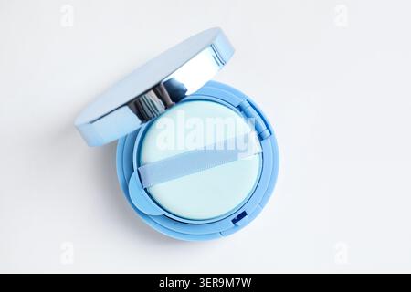 Cushion foundation on white background, top view. Makeup product Stock Photo
