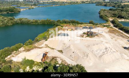 Aggrated Aerial view of an industrial aggregate screening installation with blue ...