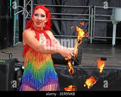 Fire eater performing with flames at Warrington Pride 2026 in Warrington town centre, Cheshire, England, UK. Stock Photo