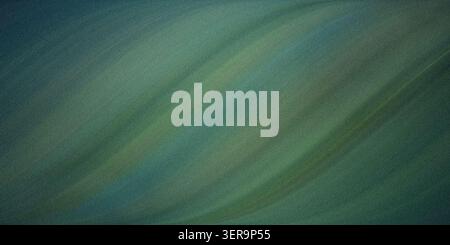 A sophisticated abstract background featuring a deep teal and green diagonal gradient, finished with a fine, consistent grainy texture. Stock Photo