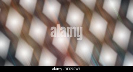 An abstract background featuring a repeating pattern of glowing, soft-focus diamond shapes with a warm, textured, and motion-blurred aesthetic. Stock Photo