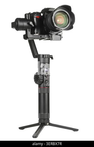 Gimbal three-axis motorized stabilizer with mounted DSLR camera isolated on white background Stock Photo