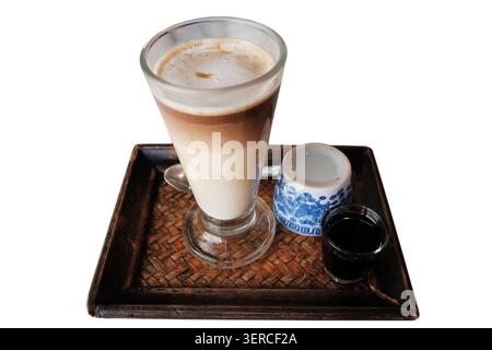 Iced latte coffee and hot black coffee with tea in a woven tray isolated on white background with clipping path Stock Photo