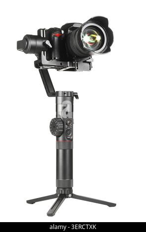 Gimbal three-axis motorized stabilizer with mounted DSLR camera isolated on white background Stock Photo