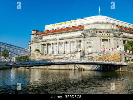 A scenic view across the Singapore River showing Elgin Bridge ...
