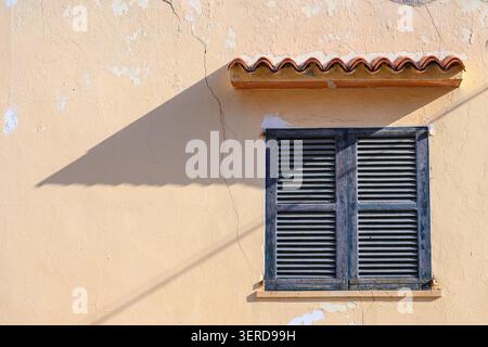 Vibrant blue window shutters, closed Stock Photo