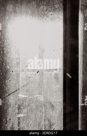 Dirty Dusty Window Glass Texture With Scratches Smudges and Natural Light Stock Photo