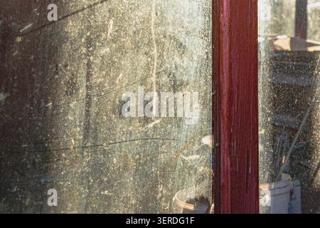 Dirty Dusty Window Glass Texture With Scratches Smudges and Natural Light Stock Photo