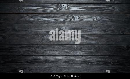 Dark wooden table background with rustic black wood texture top view Stock Photo