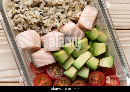 Salmon avocado and wild rice meal prep close up healthy lunch Stock Photo