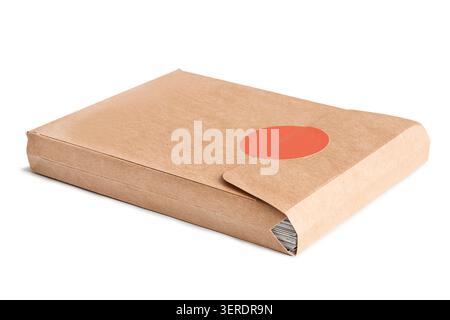 Blank craft paper closed packet lying on white background Stock Photo