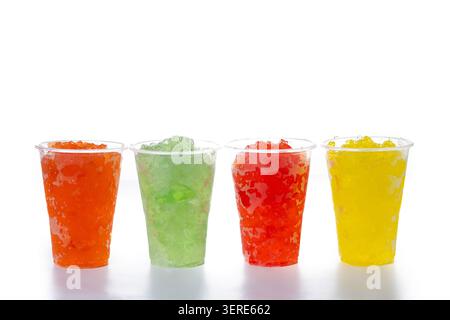 Colorful Frozen Slush Drinks in Plastic Cups Isolated on White Background Stock Photo