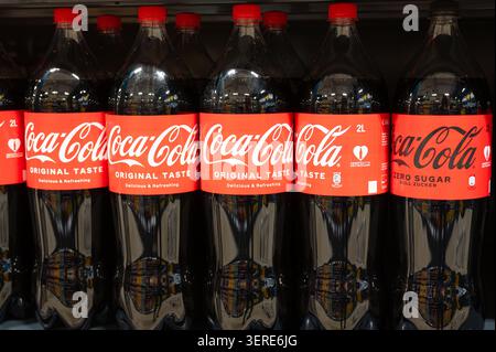 Coca cola soft drinks assortment, deposit bottles in crates ...