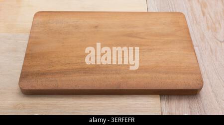 Empty Wooden Cutting Board on Light Background Stock Photo