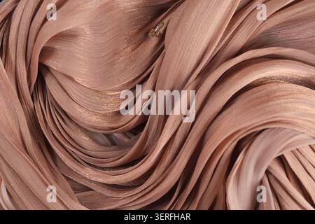 Fabric in shades of pink seen in close-up detail Stock Photo