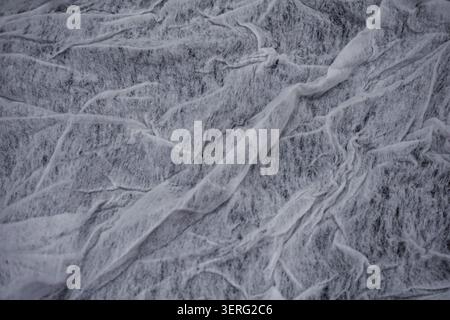 Abstract crumpled white fibrous textile texture background Stock Photo