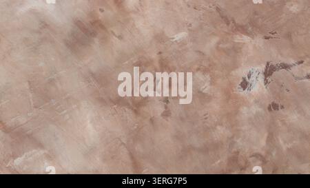 Weathered beige concrete surface with distressed texture for neutral rustic background Stock Photo
