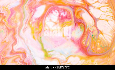 Colorful abstract marble pattern with pink orange and yellow swirls for creative design Stock Photo