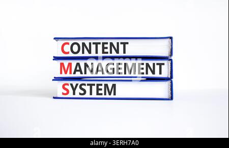 CMS content management system symbol. Concept words CMS content management system on beautiful books. Beautiful white background. Business CMS content Stock Photo