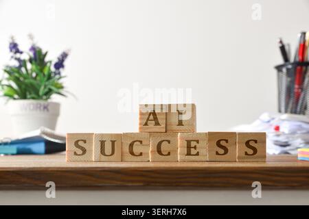 Wooden blocks spelling AI and SUCCESS on a desk, symbolizing artificial intelligence achievements, innovation, growth, technology, and business progre Stock Photo