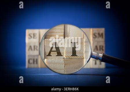 Magnifying glass highlighting AI letters on wooden blocks against a blue background, symbolizing artificial intelligence, analysis, innovation, and te Stock Photo