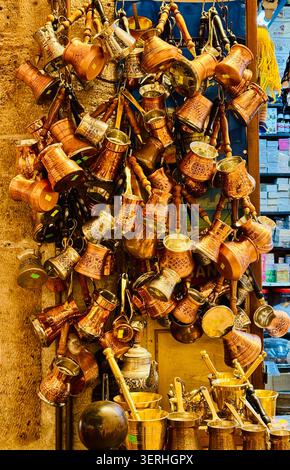 Istanbul , Turkey , 23 December, 2025 , Sale of traditional Turkish Turks for making coffee at Turkish market in Istanbul, Turkiye, Stock Photo