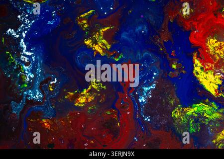Highly detailed abstract fluid art composition featuring vibrant blue, red, yellow, and white flowing textures. Perfect for creative backgrounds, mode Stock Photo