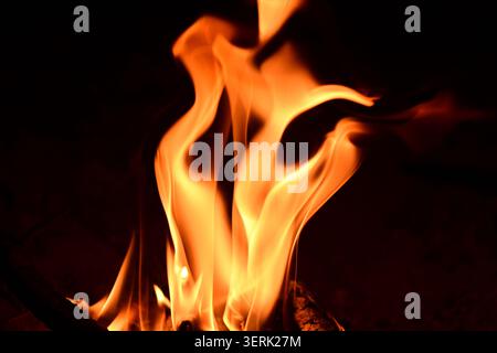 sparks and fire flame on black background Stock Photo