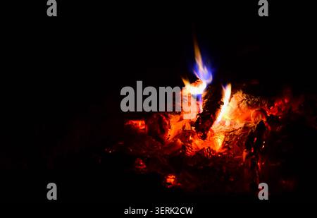 sparks and fire flame on black background Stock Photo