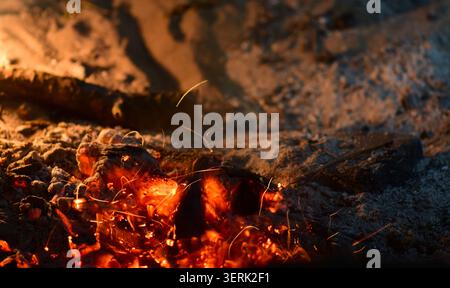 sparks and fire flame on black background Stock Photo