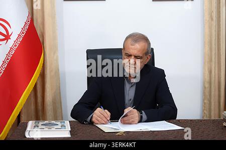 Tehran, Iran. 18th June, 2026. Iran's President Masoud Pezeshkian signing a memorandum of understanding in Tehran on June 18, 2026. US President Donald Trump and Iranian President Masoud Pezeshkian signed a memorandum of understanding early on Thursdy on June 18, ending a regional war that erupted on February 28 with US-Israeli strikes. Photo by Iranian Presidency/UPI Credit: UPI/Alamy Live News Stock Photo