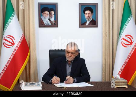 Tehran, Iran. 18th June, 2026. Iran's President Masoud Pezeshkian signing a memorandum of understanding in Tehran on June 18, 2026. US President Donald Trump and Iranian President Masoud Pezeshkian signed a memorandum of understanding early on Thursdy on June 18, ending a regional war that erupted on February 28 with US-Israeli strikes. Photo by Iranian Presidency/UPI Credit: UPI/Alamy Live News Stock Photo