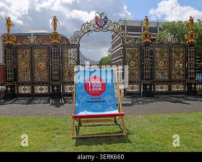 Giant WeAreWarrington BID deckchair at Warrington Food and Drink Festival outside the Town Hall golden gates, Cheshire, May 2026, WA1 1UH Stock Photo